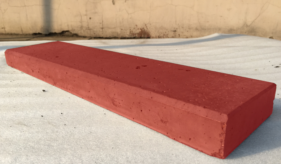 600*150*50厚洞石面红色pc砖,地面